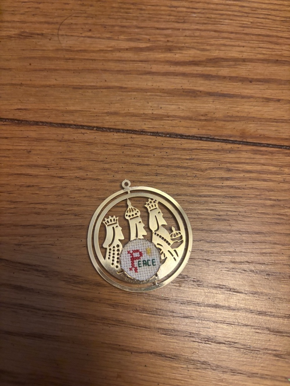 Gold Three Kings Ornament with 'Peace' Cross-Stitch